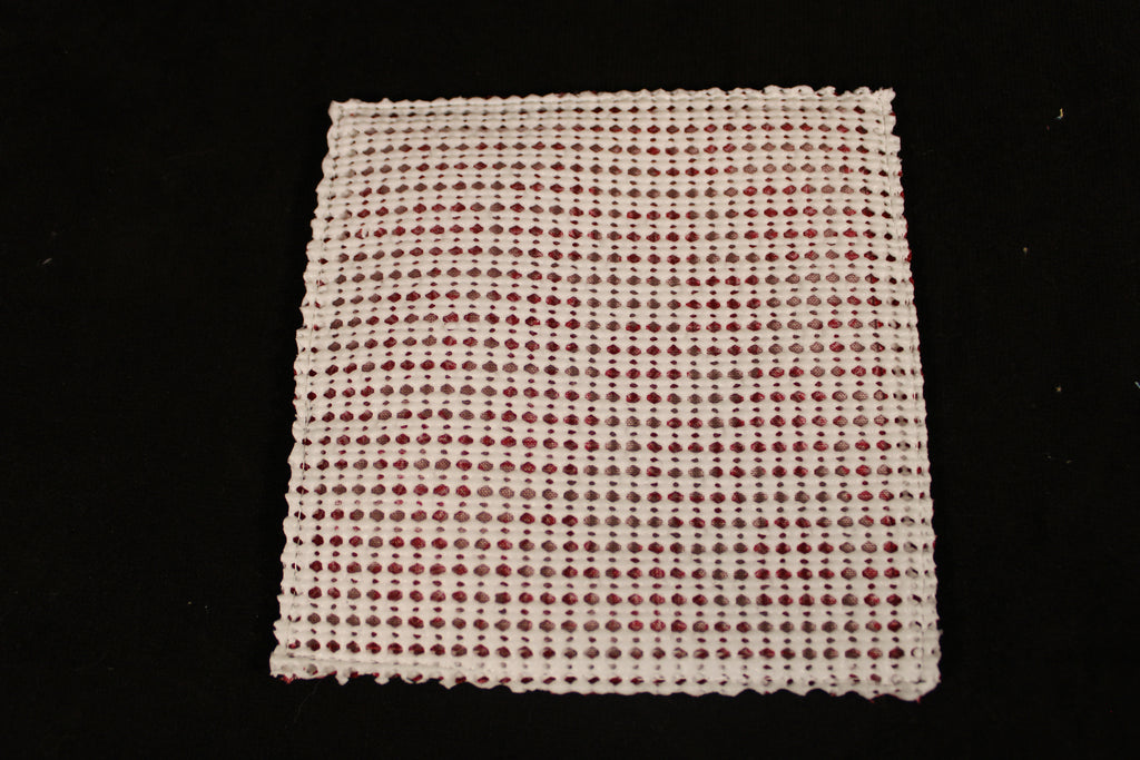 Backing is a white nonslip shelf liner. 