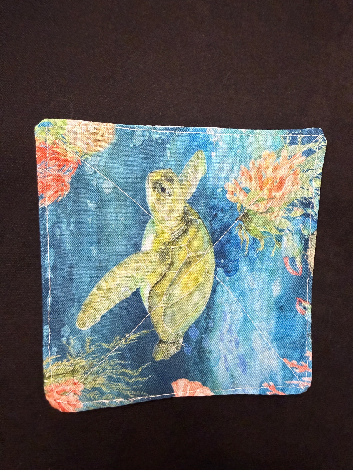 Under the Sea fabric has many variations based on what part of the fabric was used. All grippers will be different and my not have a turtle. 